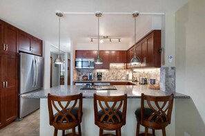 Fridge, microwave, oven, stovetop - Ma'alaea Banyans Unit 209 - Direct Oceanfront View - Split AC in Living Room and Bedroom (Wailuku)