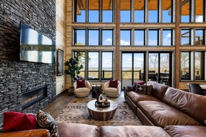 Smart-tv, eldstad, tv-spel och bordsfotboll