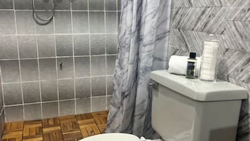 Hair dryer, towels, soap, toilet paper