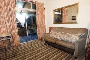 Family Duplex | Living area | Flat-screen TV