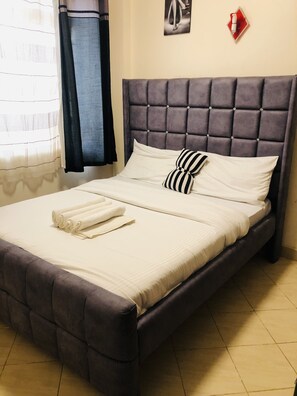 1 habitación, tabla de planchar con plancha, wifi y ropa de cama 