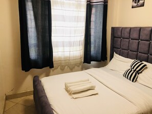1 habitación, tabla de planchar con plancha, wifi y ropa de cama 