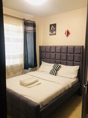 1 habitación, tabla de planchar con plancha, wifi y ropa de cama 