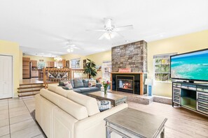 Smart TV, fireplace, books, video library
