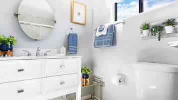 Shower, eco-friendly toiletries, hair dryer, towels