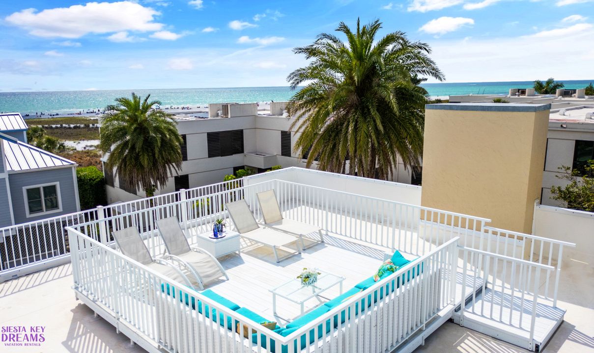 Sundeck on rooftop with partial ocean views