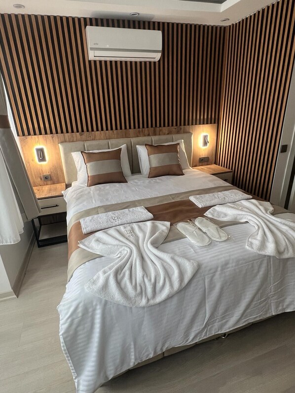 コンフォート ルーム | 高級寝具、ノートパソコン用作業スペース、防音設備、WiFi (無料)