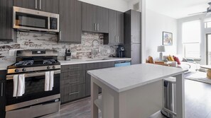 Fridge, dining tables - Landing | Amazing 1BD, Gym, Rooftop Lounge (Houston)
