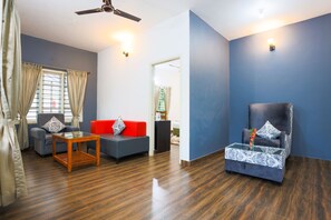 Chambre Deluxe | Salle de séjour