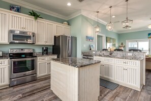 House, 4 Bedrooms | Private kitchen | Fridge, oven, coffee/tea maker, toaster - Goin' Coastal - 2703 Bienville 4 Bedroom Home by RedAwning (Dauphin Island)