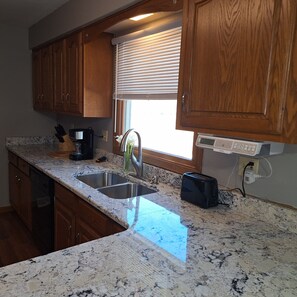 Private kitchen - Ranch style family home in quiet neighborhood with dual workspace. Pet friendly. (Amherst)