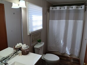 Hair dryer, towels, soap, shampoo