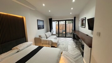 Premier Studio | Living area | 45-inch Smart TV with digital channels, heated floors