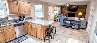 Private 4 bedroom house near the beach with pool, hot tub, fire pit, game room.