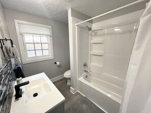 Hair dryer, towels, soap, shampoo