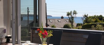 Beach view, period house, contemporary fitout in historic, fishing village