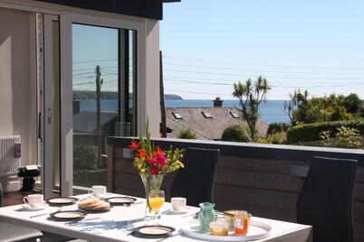 Beach view, period house, contemporary fitout in historic, fishing village