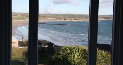 Beach view, period house, contemporary fitout in historic, fishing village