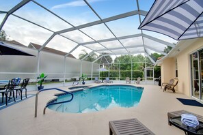 Outdoor pool, a heated pool - Heated Saltwater Pool Spa Game Room - Family friendly Tropical Oasis!  (Palm Coast)