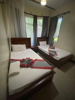Apartment, 3 Bedrooms | Desk, laptop workspace, iron/ironing board, free WiFi - Jaanst Paradise Homes (Mombasa)