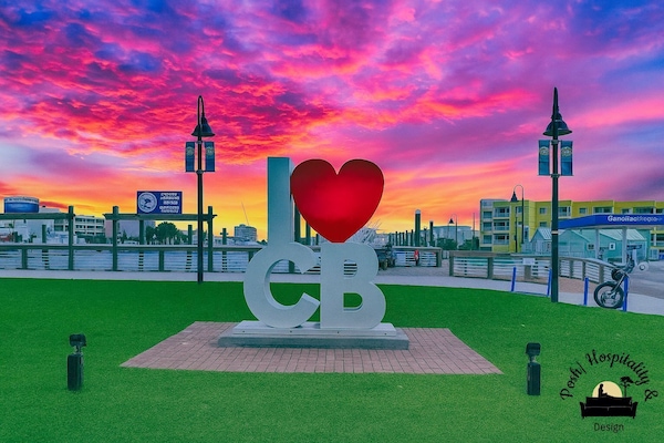 Visit the CB Mural by the charter docks and snap a pic at sunset!