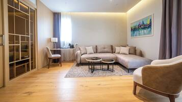 Junior Suite | Living area | 40-inch LED TV with digital channels