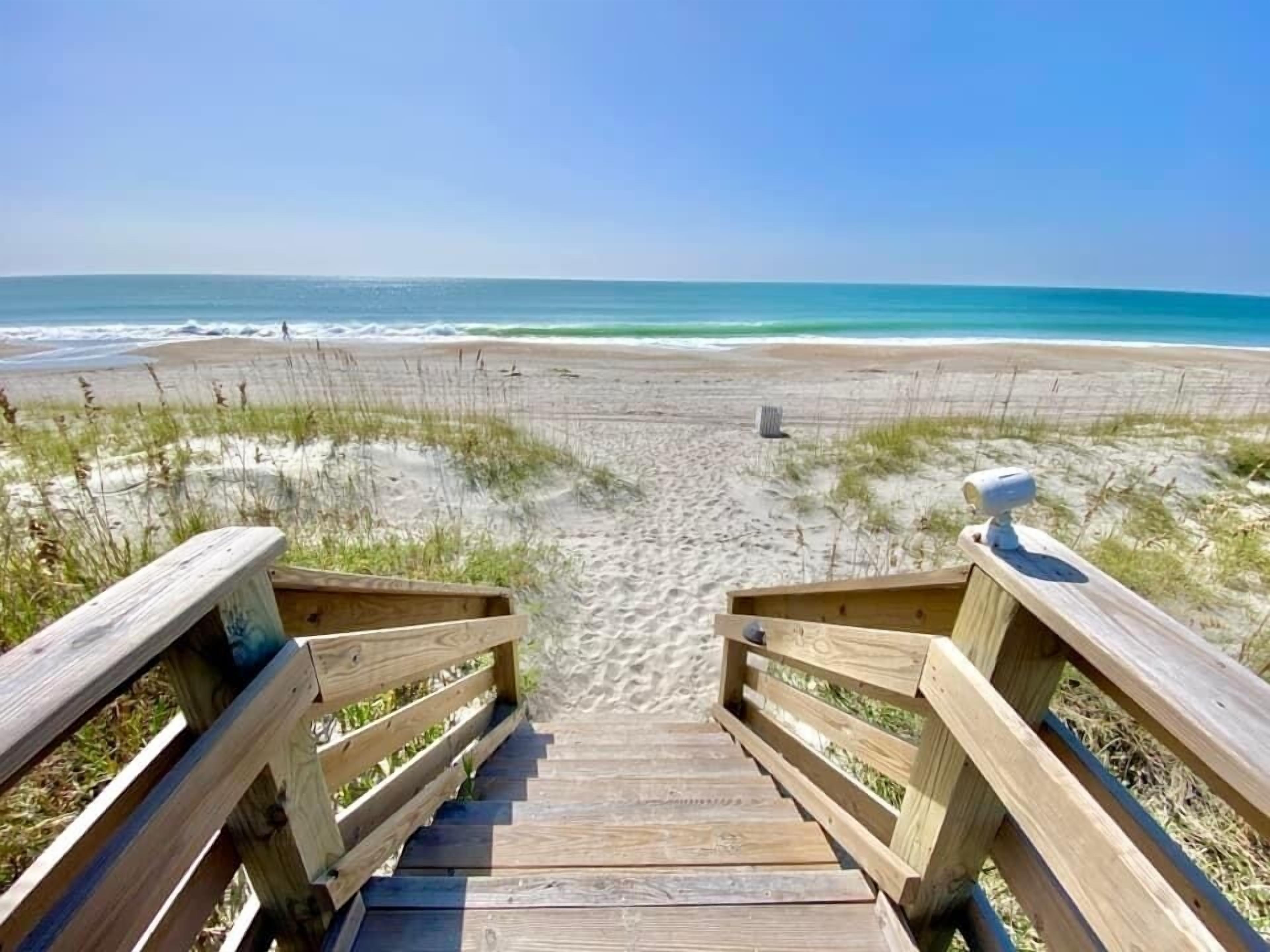On the beach, sun-loungers