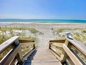 A wooden boardwalk leading to a beach with a clear view of the ocean. - Ocean View Condo - Pet-friendly, Ocean View (Atlantic Beach)