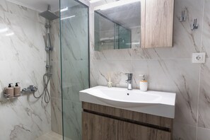 Hair dryer, towels, soap, shampoo