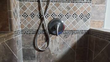 Shower, eco-friendly toiletries, hair dryer, towels