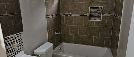Hair dryer, towels, soap, shampoo