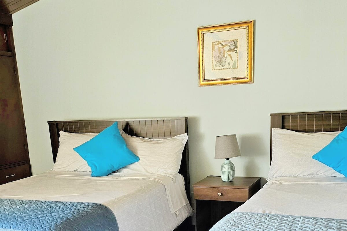 Exclusive Suite, 2 Double Beds | 1 bedroom, down duvets, desk, blackout curtains