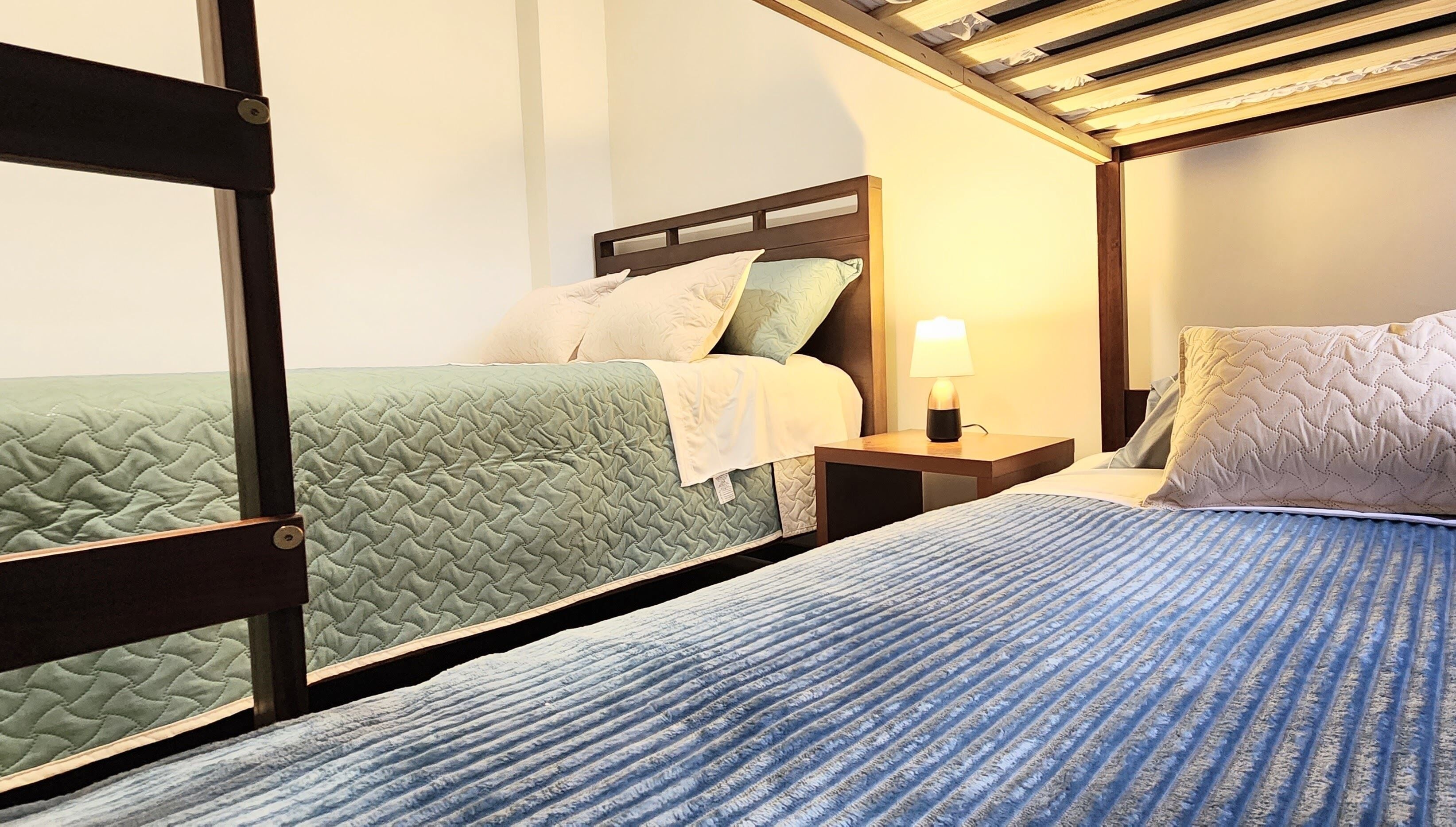 Down duvets, desk, laptop workspace, blackout curtains