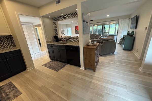 View from kitchen to Living area and porch