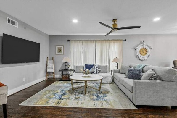 Smart TV, fireplace, foosball, books