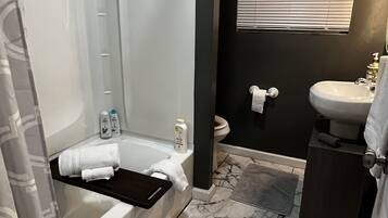 Hair dryer, towels, soap, shampoo