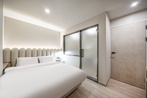 Desk, laptop workspace, blackout drapes, soundproofing