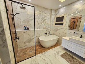 Hair dryer, towels, soap, toilet paper - Modern Zamalek Condo by Marriott (Zamalek, Cairo)