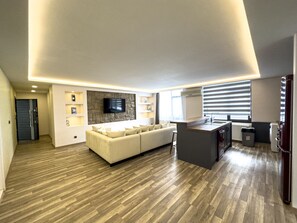 Habitación urbana | Área de sala de estar