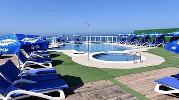 Seasonal outdoor pool, pool umbrellas, sun loungers