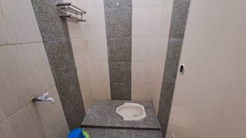 Economy Double Room | Bathroom | Shower, soap