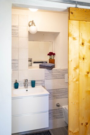 Eco-friendly toiletries, hair dryer, towels, soap