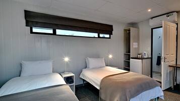 1 chambre, minibar, bureau, draps fournis