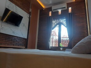 Standard Double Room | Free WiFi, bed sheets - Capital O 93719 Homestay Omah Bidadari (Prambanan)