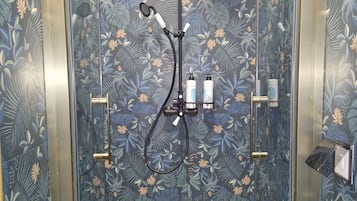 Comfort Room | Bathroom | Hair dryer, towels, soap, shampoo