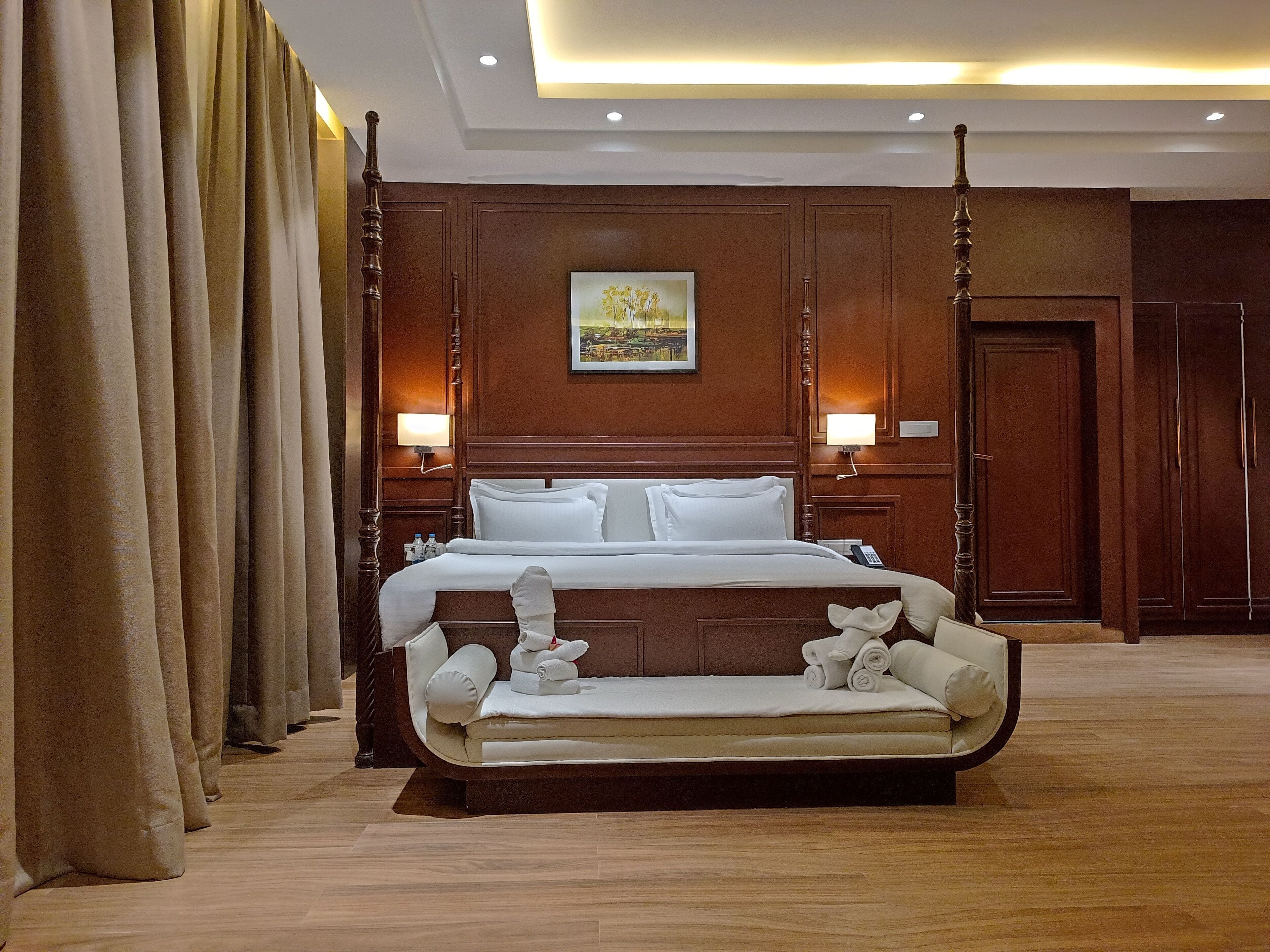 Luxury Suite, Pool View | Premium bedding, in-room safe, soundproofing, iron/ironing board