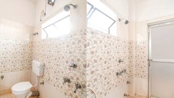 Shower, rainfall showerhead, towels, soap