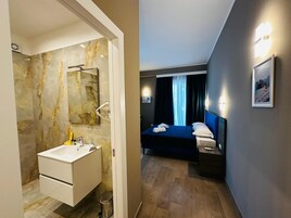 Deluxe Double Room, City View | Minibar, in-room safe, desk, blackout drapes