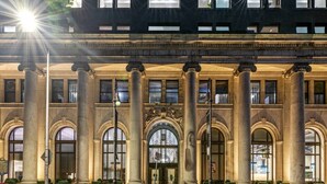 A large, historic building with a grand entrance, large columns, and arched windows. - Sosuite Studio Acc. w Shared W/d, Gym, Lounge (Philadelphia)