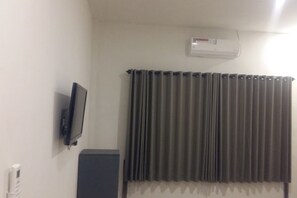 Deluxe Double Room | Bed sheets - OYO 93751 Sunrise Homestay (Kuta)